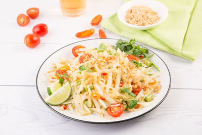 High angle view of salad in bowl on table