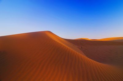 Oetune beach. id. scenic view of desert against clear blue sky