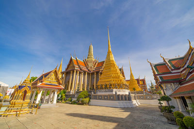 Temple outside building against sky