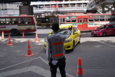 People standing on street in city