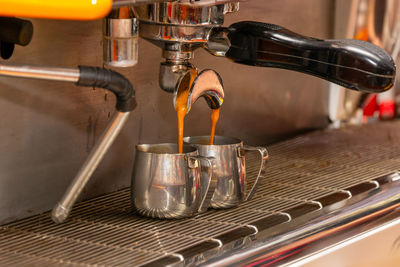 Coffee extraction from professional coffee machine high quality photo