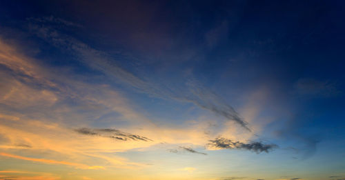 Low angle view of dramatic sky during sunset