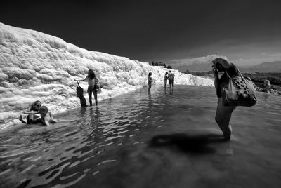 People enjoying in travertine pool at pamukkale