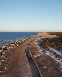 Scenic view of sea against clear blue sky