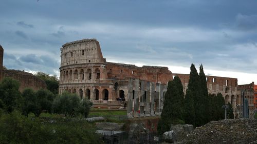 View of historical building against cloudy sky