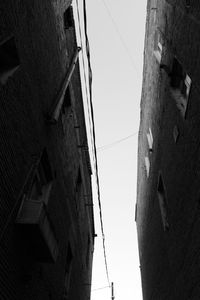 Low angle view of buildings against clear sky