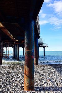 Pier over sea against sky