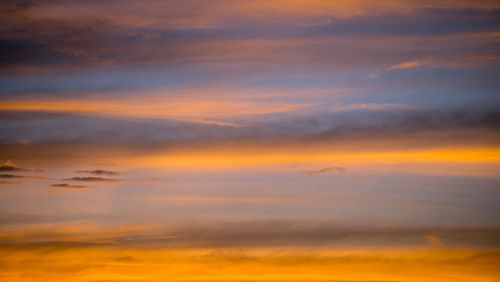 Low angle view of dramatic sky during sunset