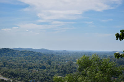 Scenic view of tree mountains against sky