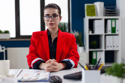 Portrait of businesswoman sitting at office