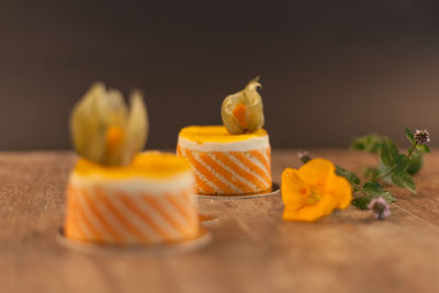 Close-up of yellow and fruits on table