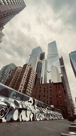 Low angle view of modern buildings against sky