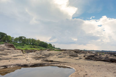 Scenic view of land against sky