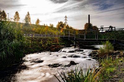 Scenic view of river against sky