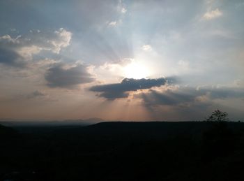 Scenic view of silhouette landscape against sky during sunset