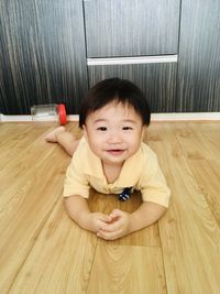 Portrait of cute baby girl at home