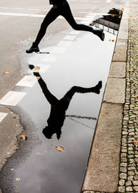 Low angle view of men with people in background