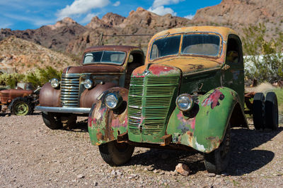 Abandoned vintage car on land