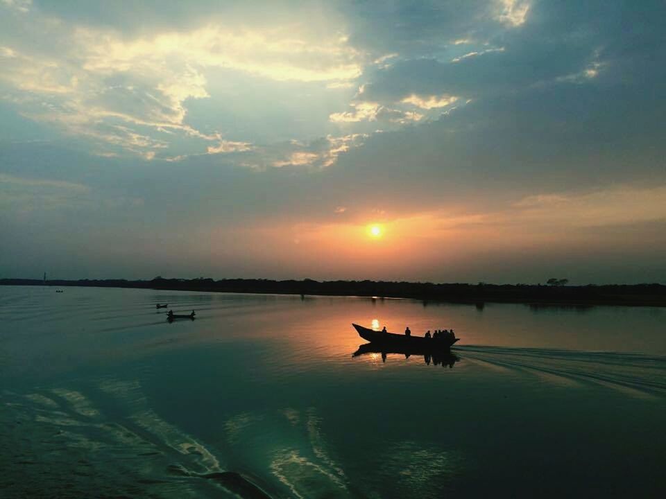 sunset, water, transportation, nautical vessel, sky, mode of transport, boat, cloud - sky, sea, silhouette, scenics, tranquil scene, tranquility, beauty in nature, reflection, moored, nature, orange color, cloudy, cloud