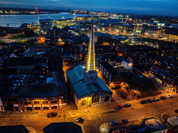 High angle view of illuminated cityscape at night