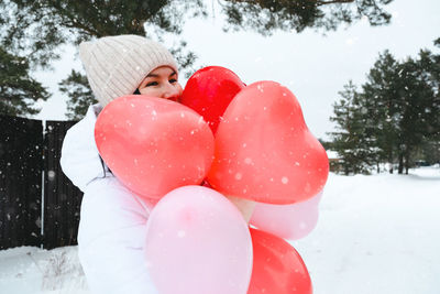 Close-up of balloons on snow