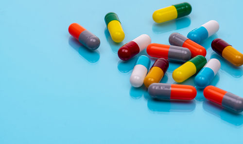 Close-up of pills on blue background
