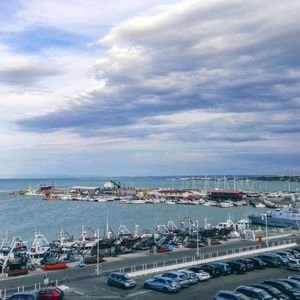 High angle view of road by sea against sky