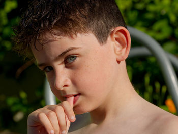 Close-up of boy looking away