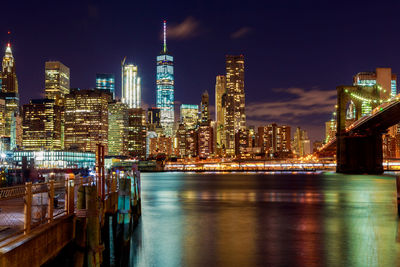 Illuminated buildings in city at night