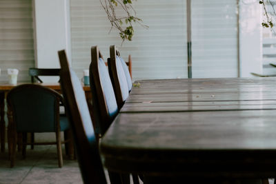 Empty chairs and table in restaurant