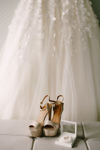 Close-up of wedding rings on table