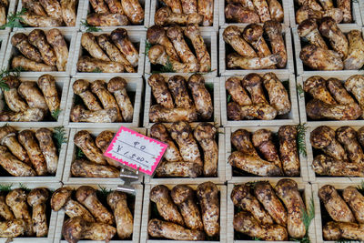 Directly above shot of mushrooms in market for sale