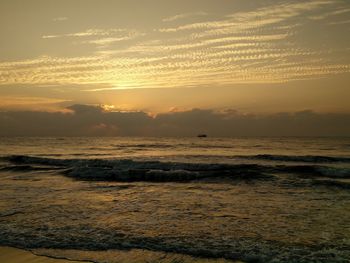 Scenic view of sea at sunset