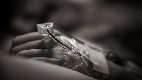 Close-up of woman holding ring