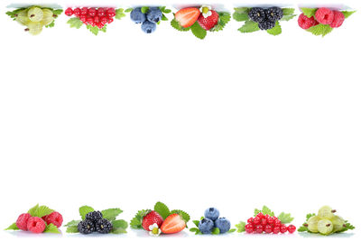 Close-up of fruits against white background