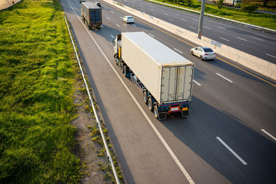 High angle view of vehicles on road in city