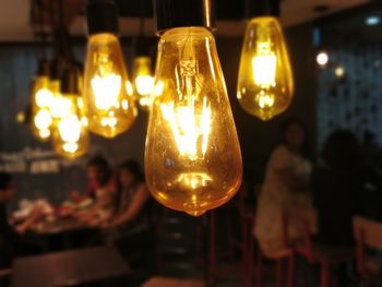 Close-up of illuminated light bulb