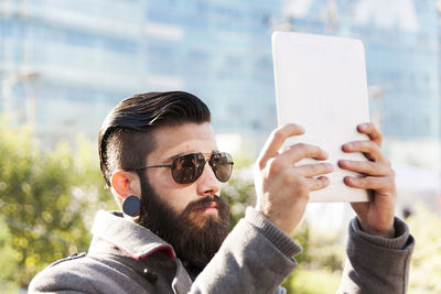 Young woman using mobile phone