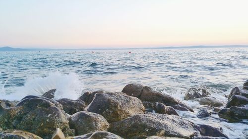 Scenic view of sea at sunset