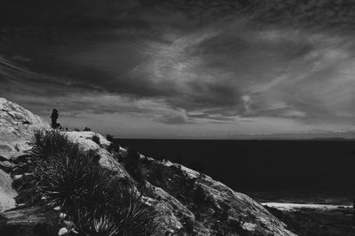Scenic view of sea against cloudy sky