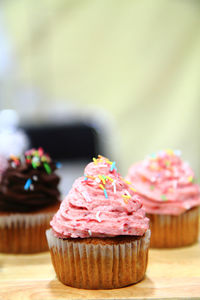 Close-up of cupcakes on table