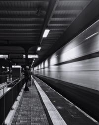 Man at railroad station