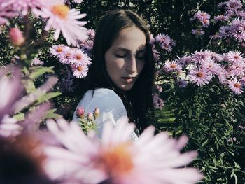 Portrait of young woman outdoors