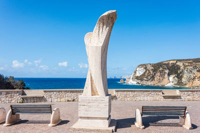 Scenic view of sea against blue sky