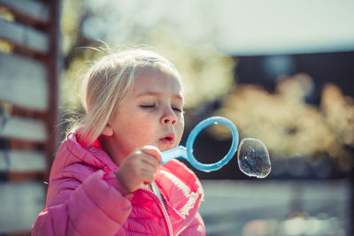 Rear view of woman with bubbles