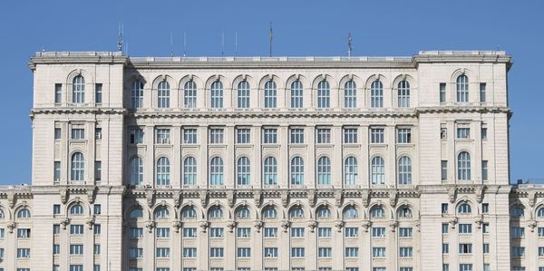 Low angle view of building against blue sky