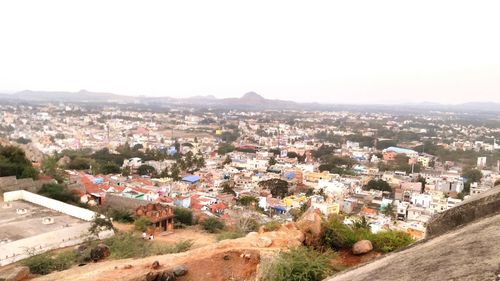 High angle view of town against clear sky