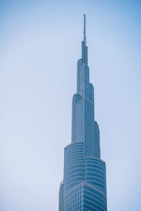 Low angle view of skyscrapers against clear sky