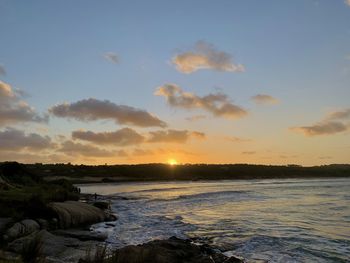 Scenic view of sea against sky during sunset