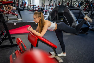 Woman exercising in gym